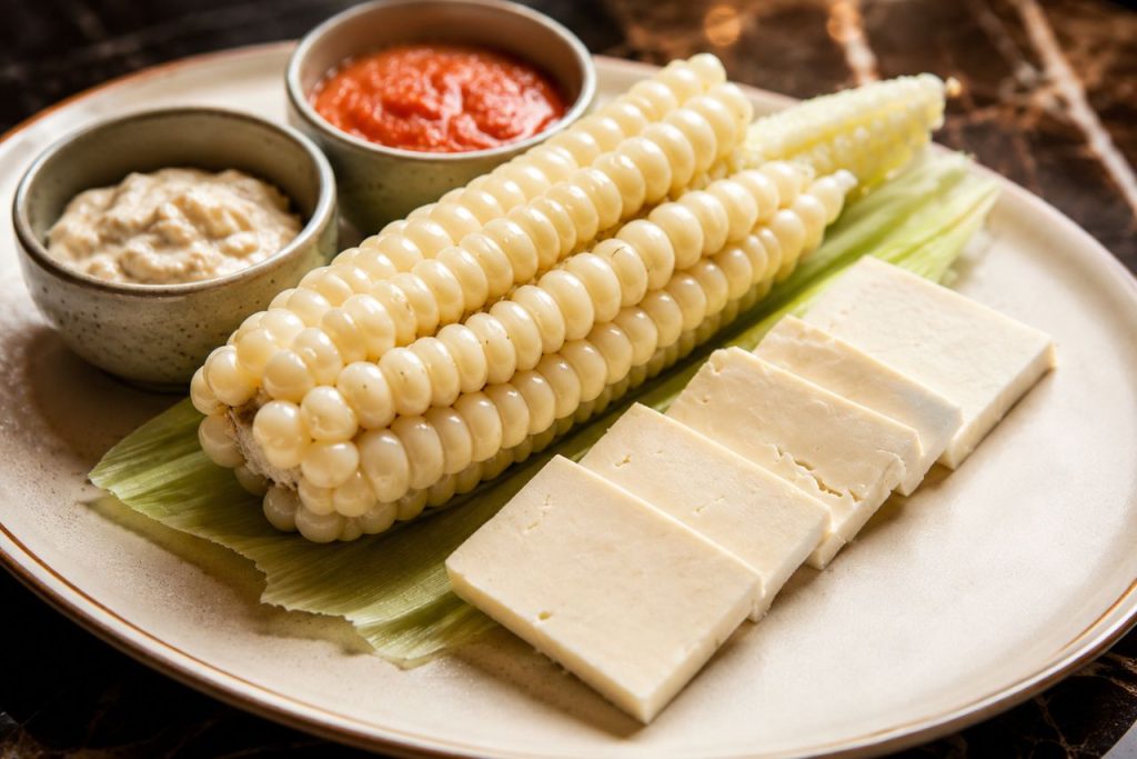 Choclo con Queso - What to Eat in Cusco
